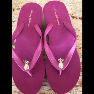 Tommy Bahama Bimini Wedge Sandals in magenta.